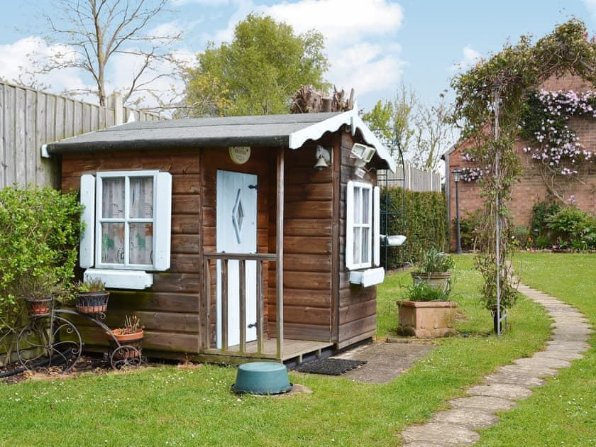 Charming playhouse in the garden | Ringstead Cottage, Ringstead, near Hunstanton