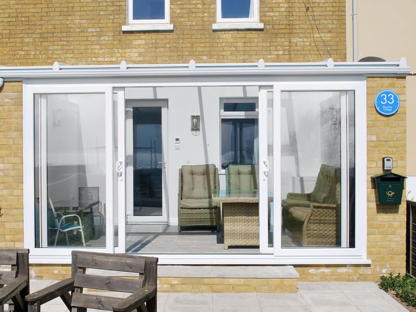 Holiday property with conservatory | Shoreline Cottage, Sandown