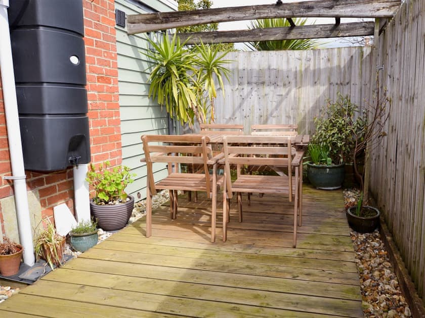 Small enclosed courtyard with garden furniture | 20 Bellevue Road, Ryde