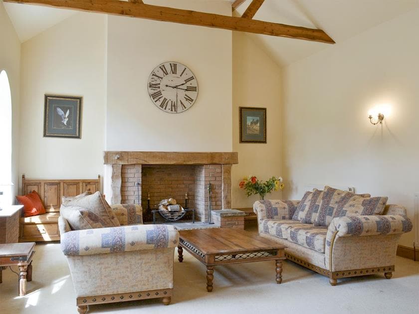 Stylish living room with exposed wood beams | Binbrook House Mews - Chestnuts Farm Cottages, Binbrook, near Market Rasen