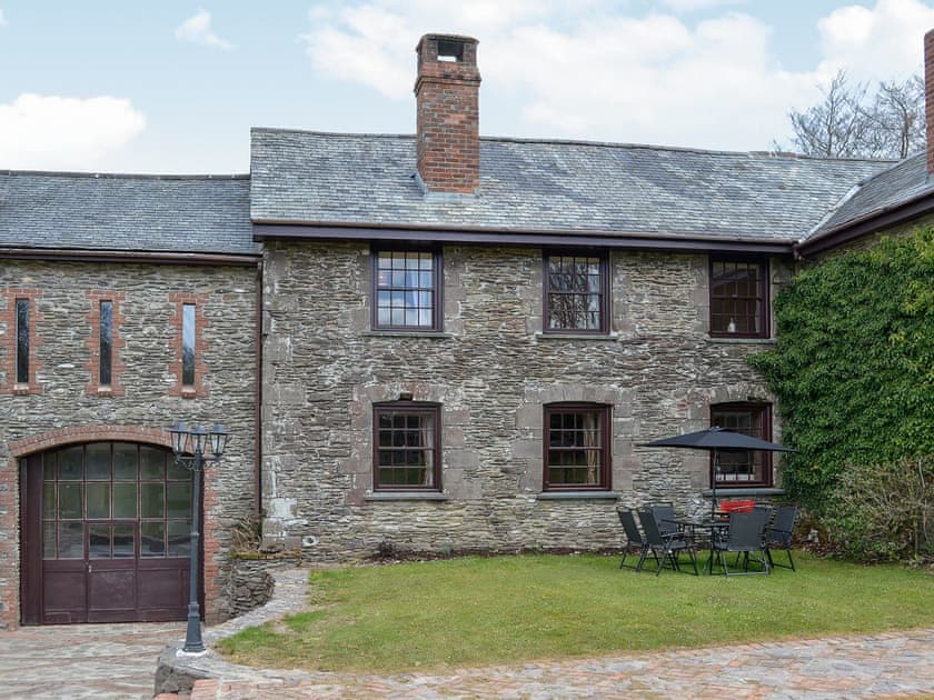 Substantial stone-built former farm building | Bridge House - Lower North Radworthy Cottages, Heasley Mill, near South Molton
