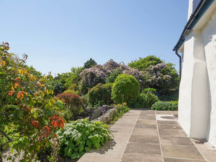 Paved patio area in beautiful garden | Preswylfa, Llanddona, near Bangor