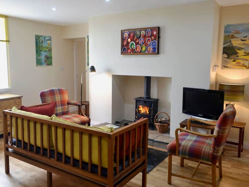 Relaxing living and dining room with multi-fuel burner | Brier Dene End Cottage, Old Hartley, near Whitley Bay 