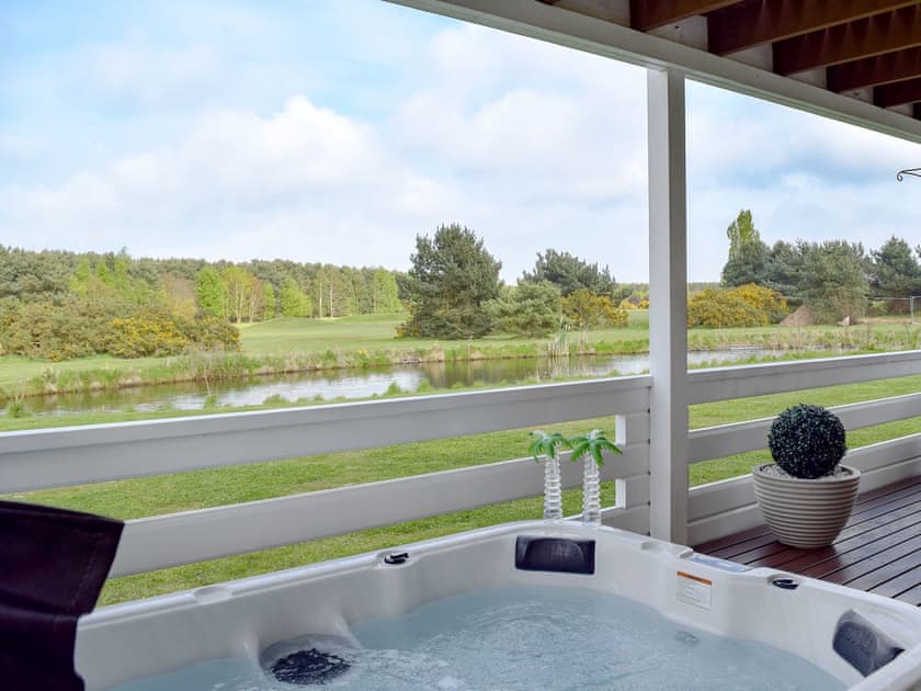 Relaxing hot tub | Pine View, Fritton, near Great Yarmouth