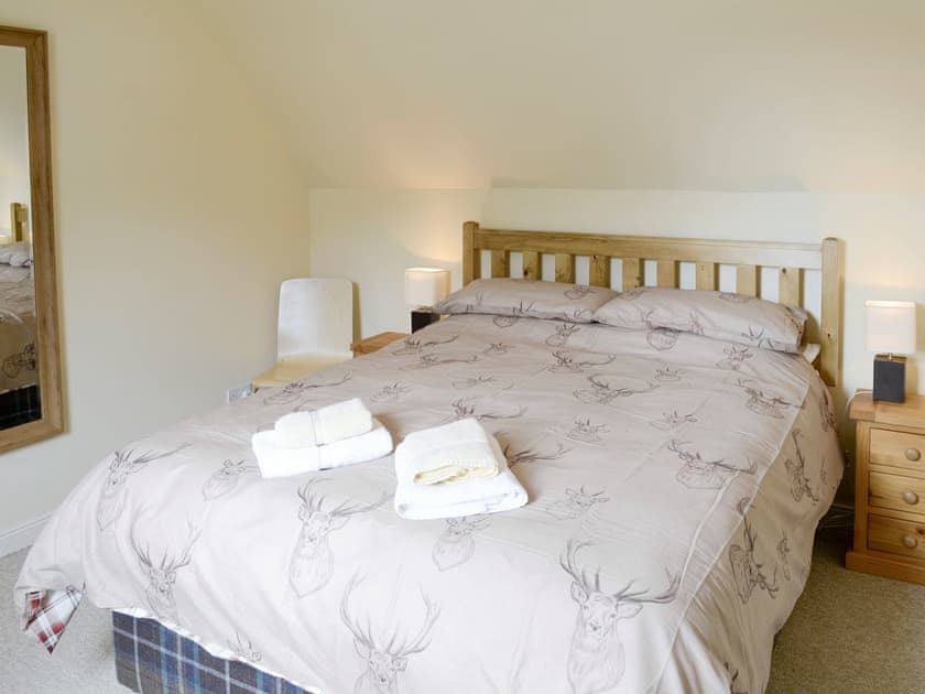 Comfortable double bedroom | Rowan Cottage - Glenrossal Cottages, Rosehall, near Lairg