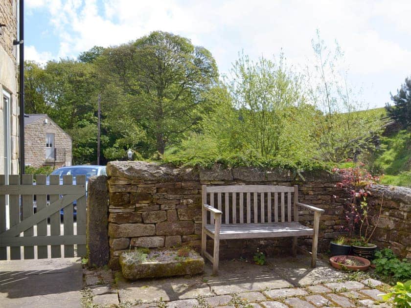 Additional outdoor seating within enclosed patio | West Barn, Holymoorside, near Chesterfield