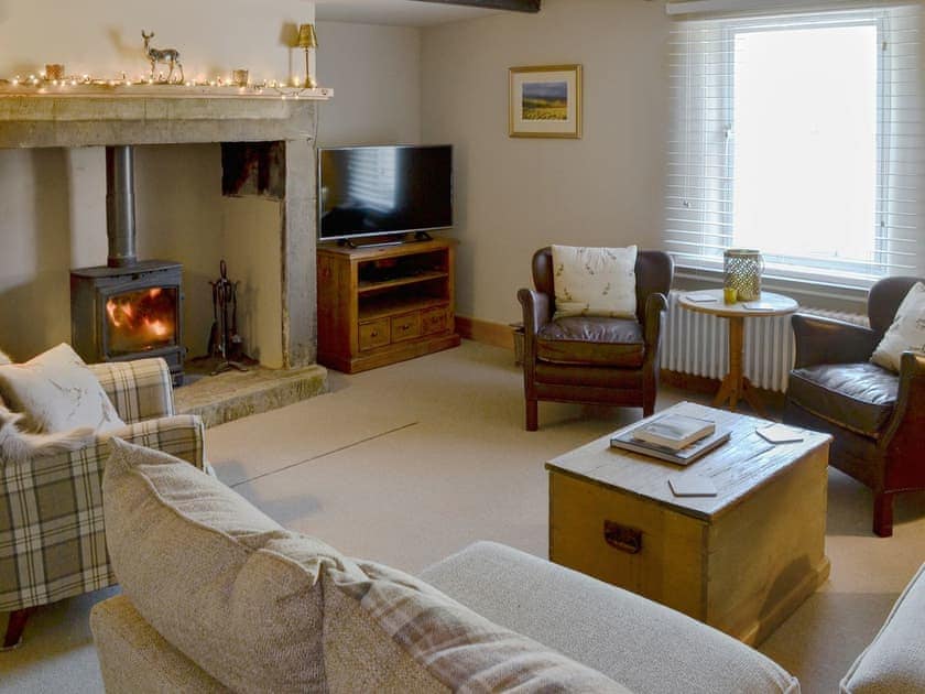 Beautifully presented cosy living room with a wood burner | West End Cottage, Whittingham, near Alnwick