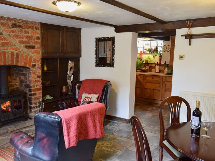 Dining room with sitting area leading to kitchen  | Hope Cottage, Whitby