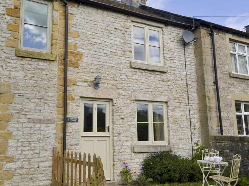 Terraced, natural stone-built cottage | Perriwinkle Cottage, Great Longstone, near Bakewell