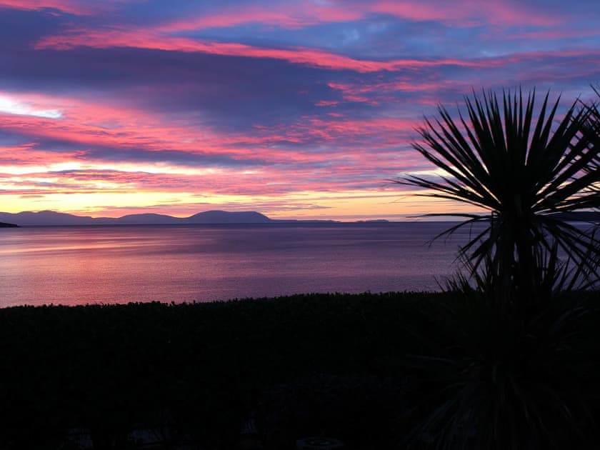 Gorgeous sunsets can be enjoyed from  the property | Beach Cottage, Clachangarbh, Gairloch