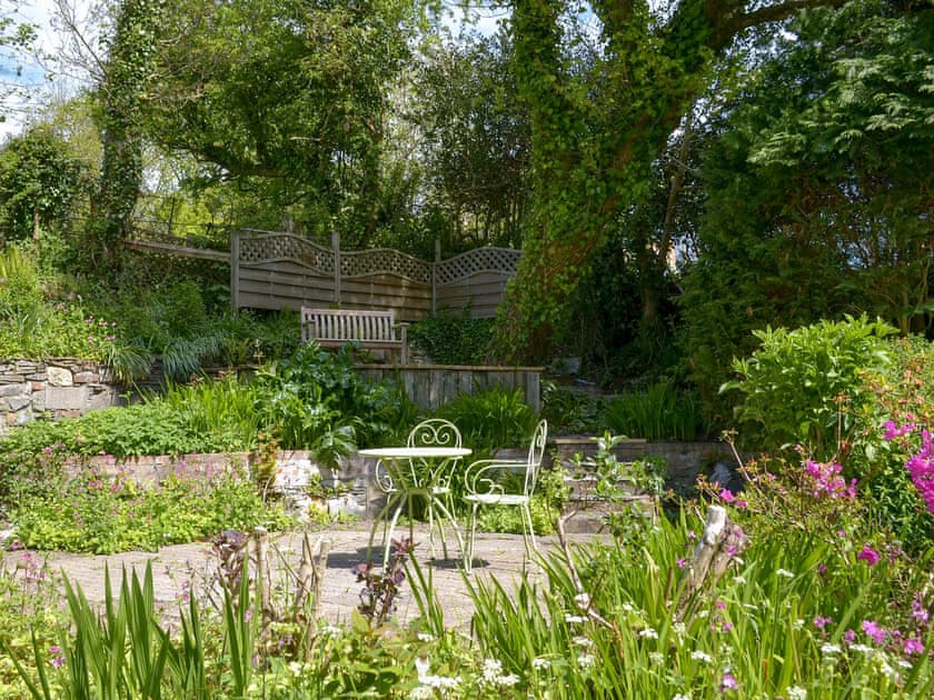 Relaxing sitting out area in the garden | The Thatch Cottage, South Petherwin, near Launceston