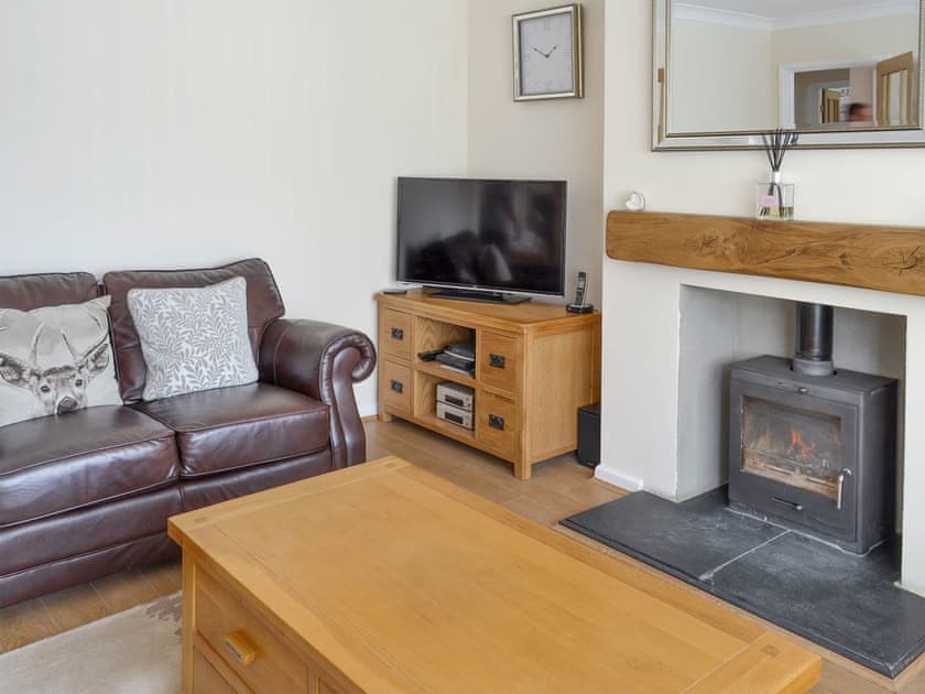 Wood burner in stylish living room | The Retreat, Hunmanby, near Filey