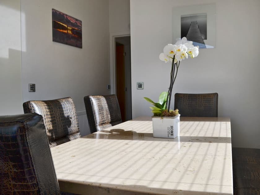 Inviting dining area | Ysgubor FadogEin Yfory, Brynteg, near Benllech