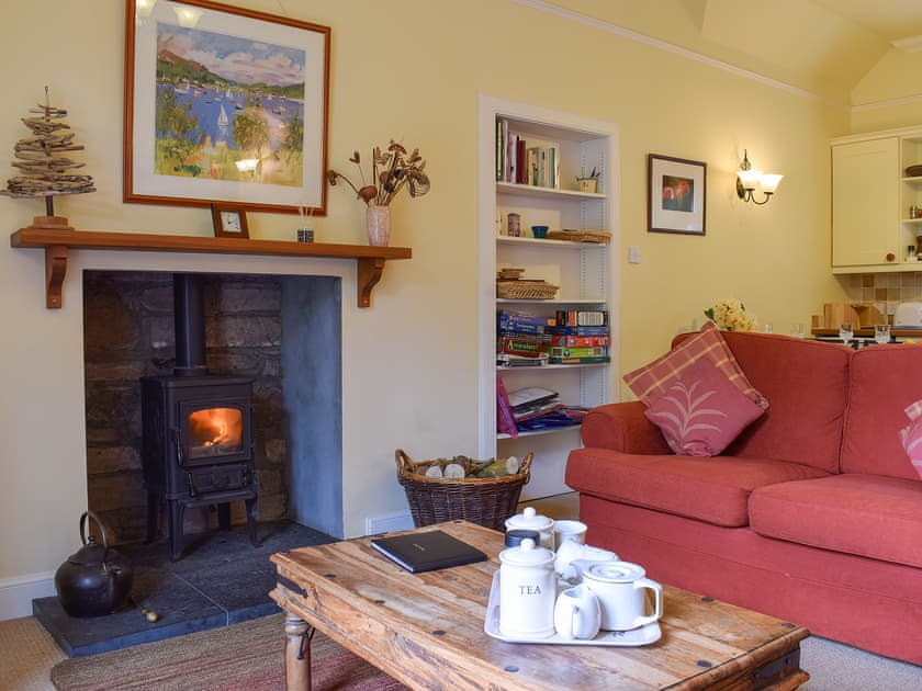 Warm and welcoming living area with wood burner | Glebe Cottage, Scone, near Perth