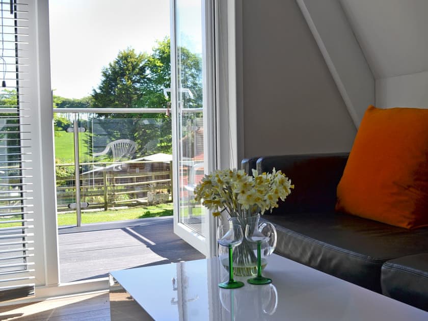 Balcony from living room | Hives - At Berridon Lodges, Bradworthy, near Holsworthy