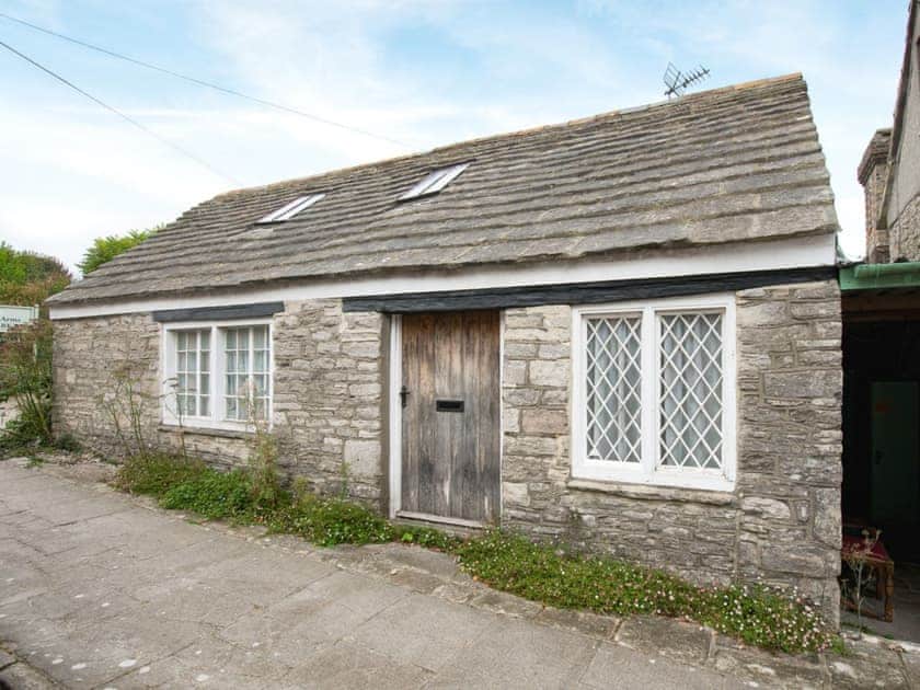 Traditional single-storey stone cottage | The Old Forge, Kingston, near Corfe Castle