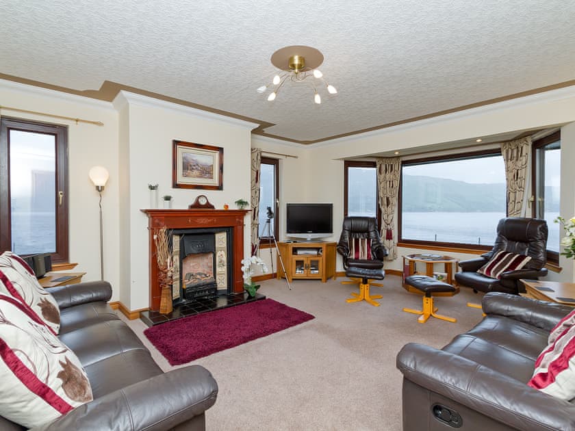 Living room with fantastic views  | Loch Duich Cottage, Inverinate, by Kyle