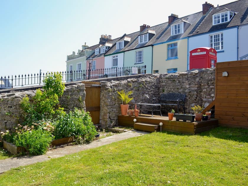 Enclosed garden with sitting-out area, garden furniture and barbecue | Providence Cottage, Turnchapel, near Plymouth