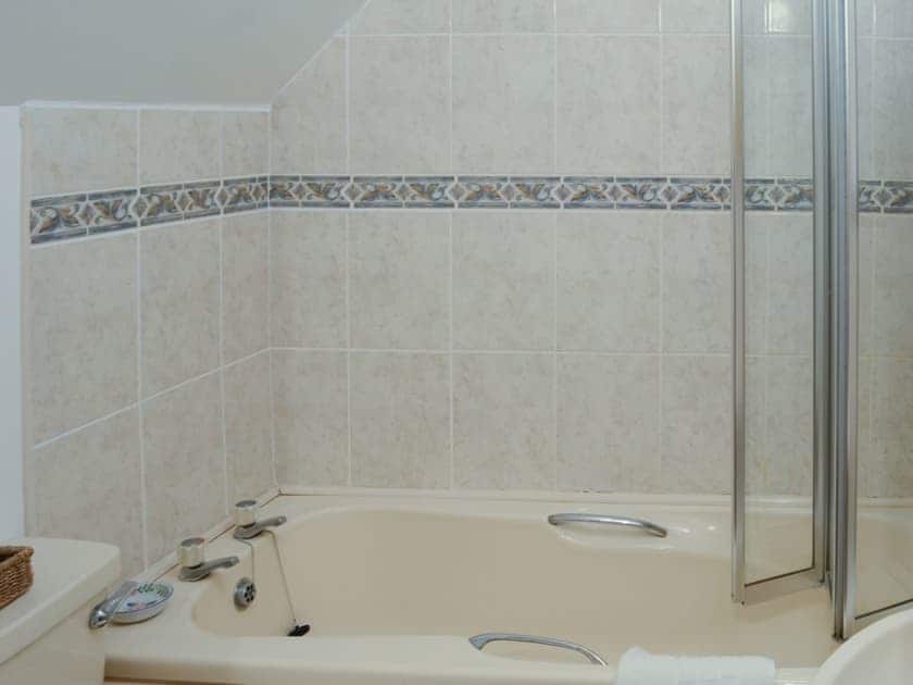 Bathroom with shoer over the bath | Watermill Cottages - Watermill Cottages, John O’ Groats