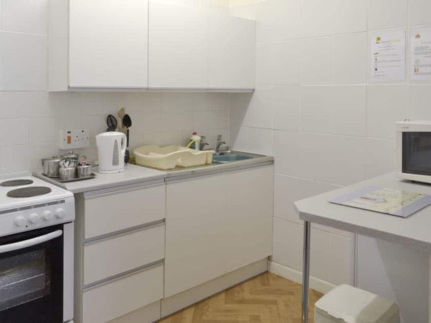 Fully-equipped kitchen area | Huccaby Tor - Devon Palms, Maidencombe, near Torquay