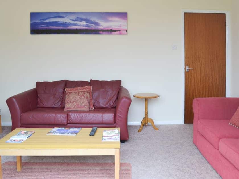 Comfortable living room | Honeysuckle Bungalow - Devon Palms, Maidencombe, near Torquay