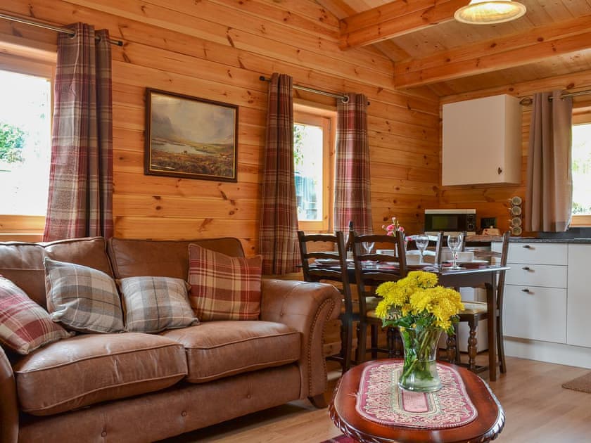 Charming and cosy living area | Cruachan Log Cabin, Banavie, near Fort William