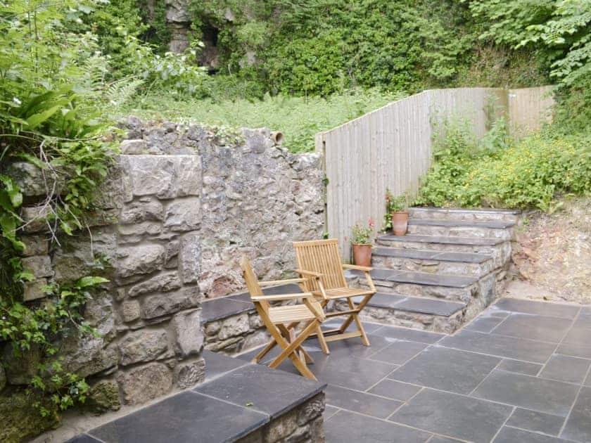 Paved patio area with outdoor furniture | Ty Newydd y Graig, Tremeirchion, near St. Asaph