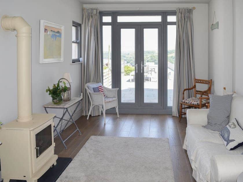Lovely open plan living area with patio doors to terrace | Weald, Salcombe