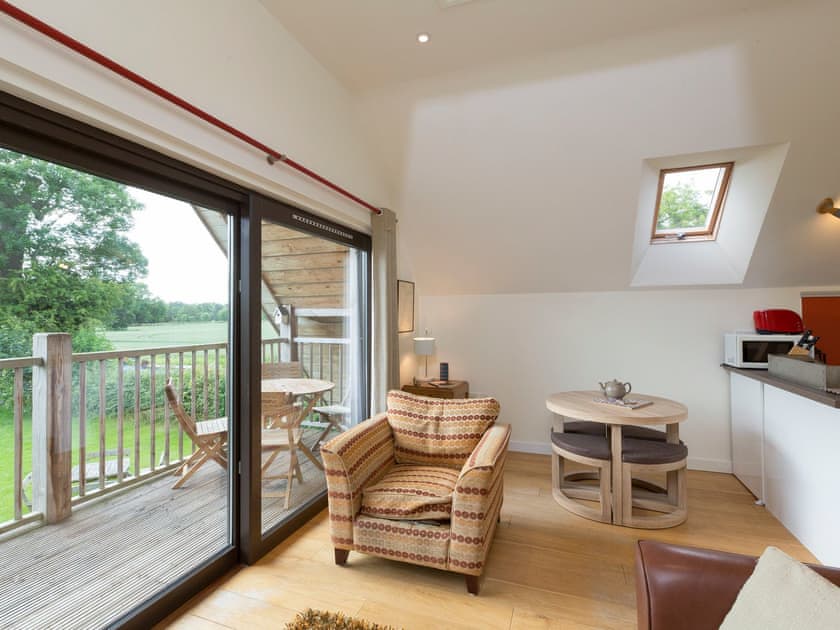 Cosy living area of open-plan room | Canal Central, Maesbury Marsh, near Oswestry
