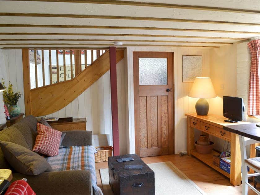 Open plan living space with French doors and beams | The Workshop - Lower Court Cottages, Fluxton, near Ottery St Mary