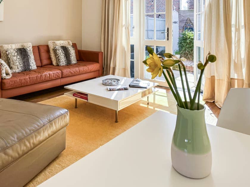 Lounge area with French doors leading to garden area | The Jolly, Whitstable