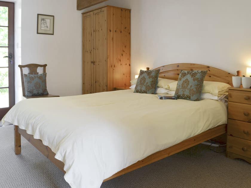 Restful double bedroom | Tarquol Cottage - Stowford Lodge Holiday Cottages, Langtree, near Great Torrington