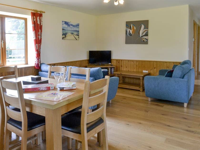 Spacious open-plan living space | Tarka’s Holt Log Cabin - Stowford Lodge Holiday Cottages, Langtree, near Great Torrington