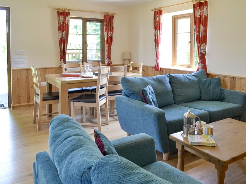 Open-plan design | Tarka’s Holt Log Cabin - Stowford Lodge Holiday Cottages, Langtree, near Great Torrington