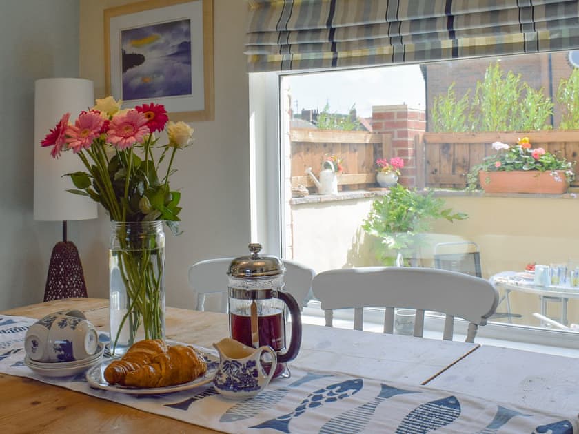 Charming dining area | Cleveland Way Cottage, Skinningrove, near Whitby