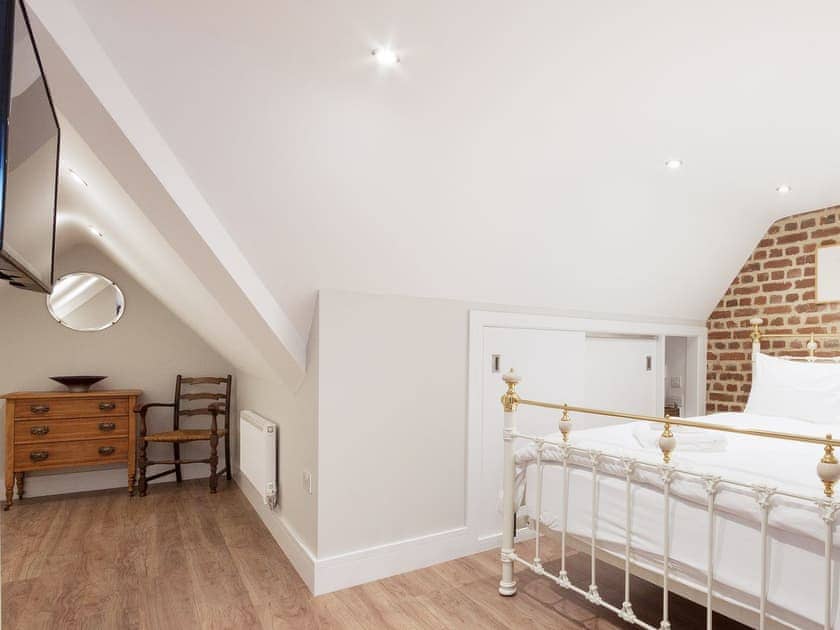 Vaulted double bedroom with super kingsize bed | Bank Apartment 2, Dartmouth