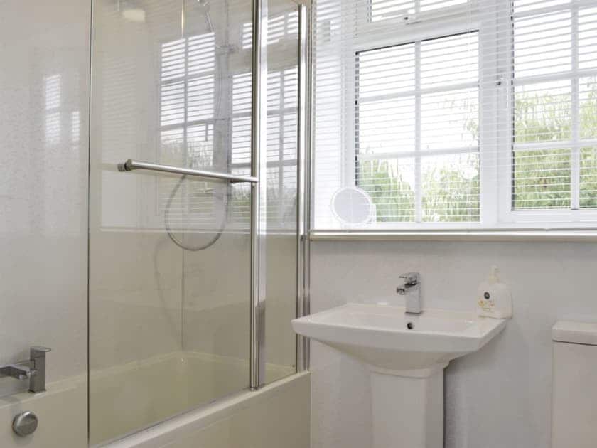 Family bathroom with shower over bath | The Granary - Summertree Farm, near Thornton-le-Dale and Pickering
