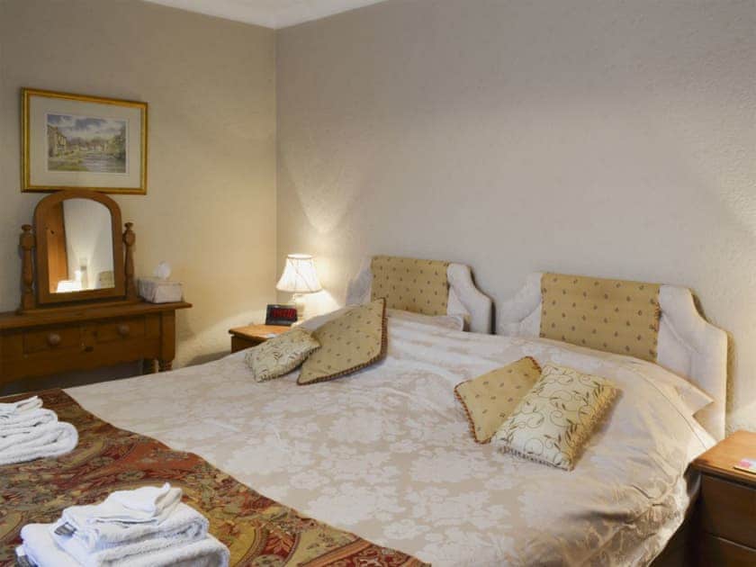 Bedroom with zip and link super kingsize bed | Swallowtail Cottage - Studley House Farm Cottages, Ebberston, near Scarborough