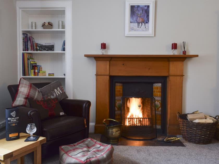 Attractive and warm dining room with open fire | Toad Hall, Aberfeldy