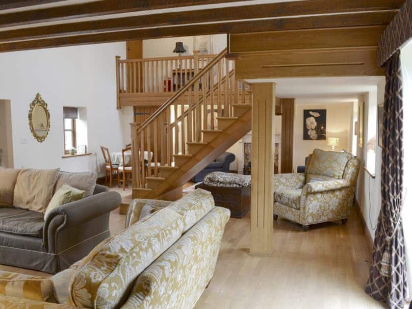 Characterful beamed ceiling and open wooden staircase | Buddileigh Farm, Betley, near Nantwich