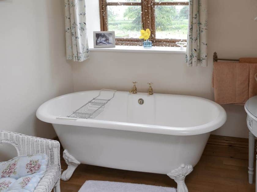 Luxurious roll top bath in family bathroom | Buddileigh Farm, Betley, near Nantwich
