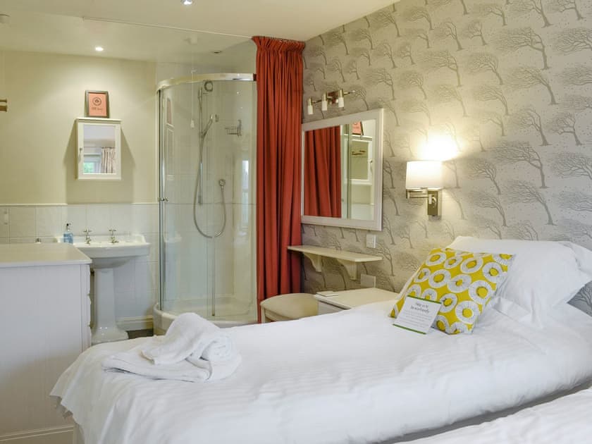 Twin bedroom with shower cubicle | Swallows Nest, Hebden, near Grassington