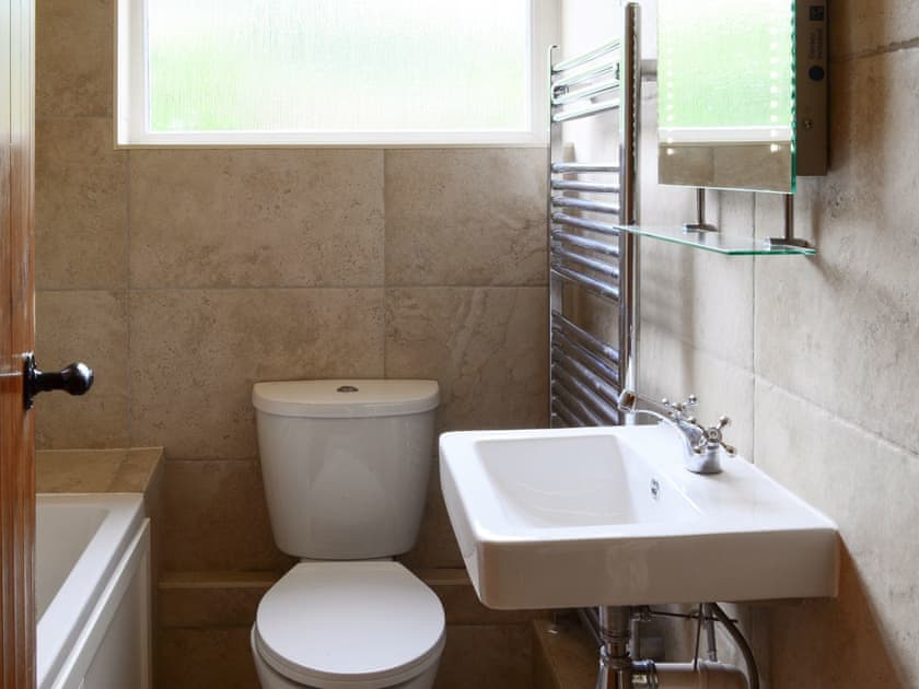 Family bathroom with heated towel rail | Oakdene Lodge, Wimborne