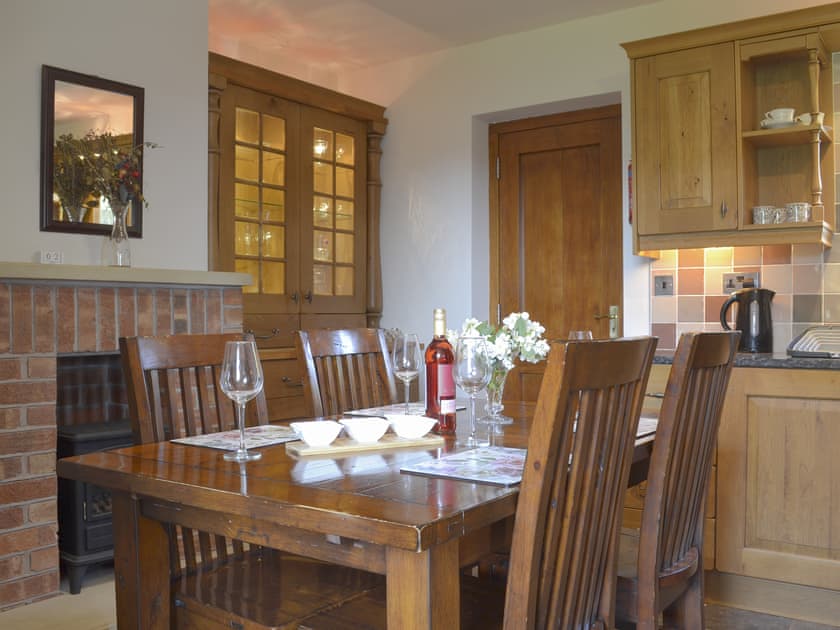 Stylish dining area within kitchen | Railway Cottage, Longcliffe, near Ashbourne