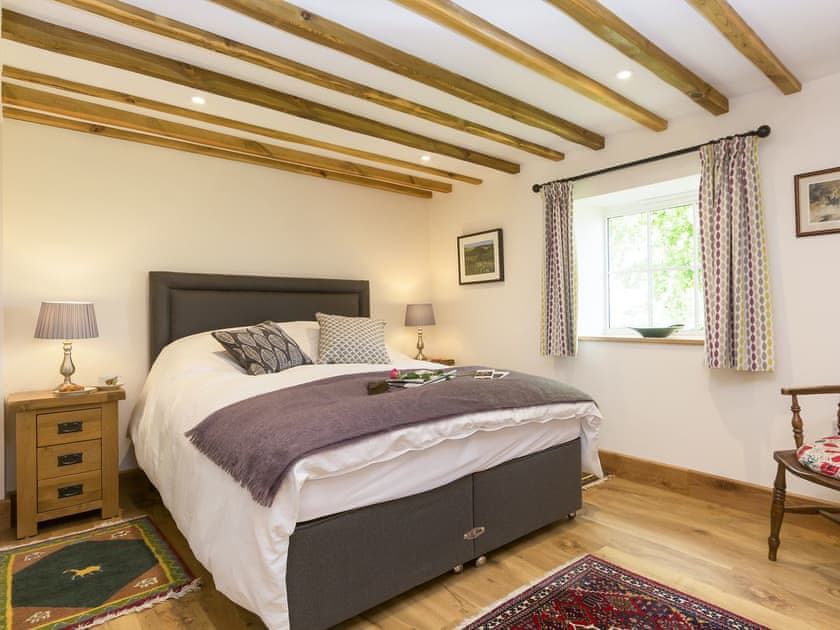 Comfy bedroom with beamed ceiling | The Calf Shed - Wood Street Farm, Royal Wootton Bassett