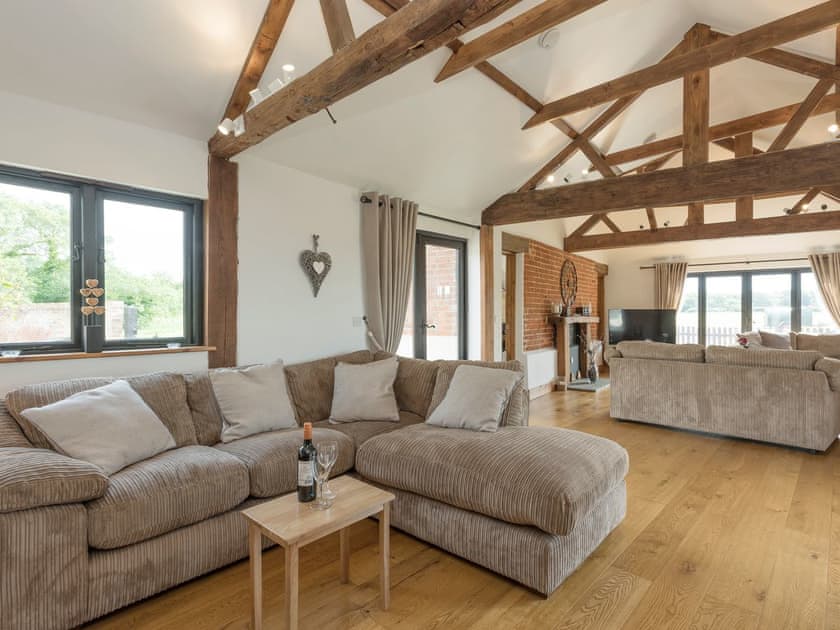 Spacious living areas with exposed beams throughout | Summer House Stables, Catfield, near Stalham