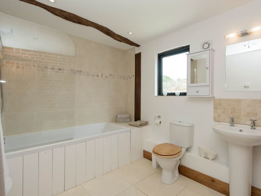 Family bathroom with shower over bath | Summer House Stables, Catfield, near Stalham