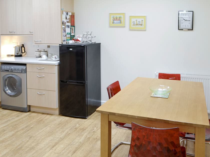 Convenient dining area within kitchen | Linnets, Beaminster