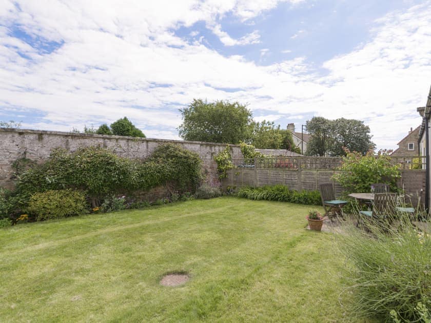 Enclosed lawned rear garden | Embleton Cottage, Beadnell