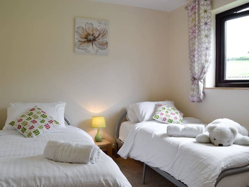 Twin bedroom | River Cottage - Mill Farm Holiday Cottages, Heyope, near Knighton